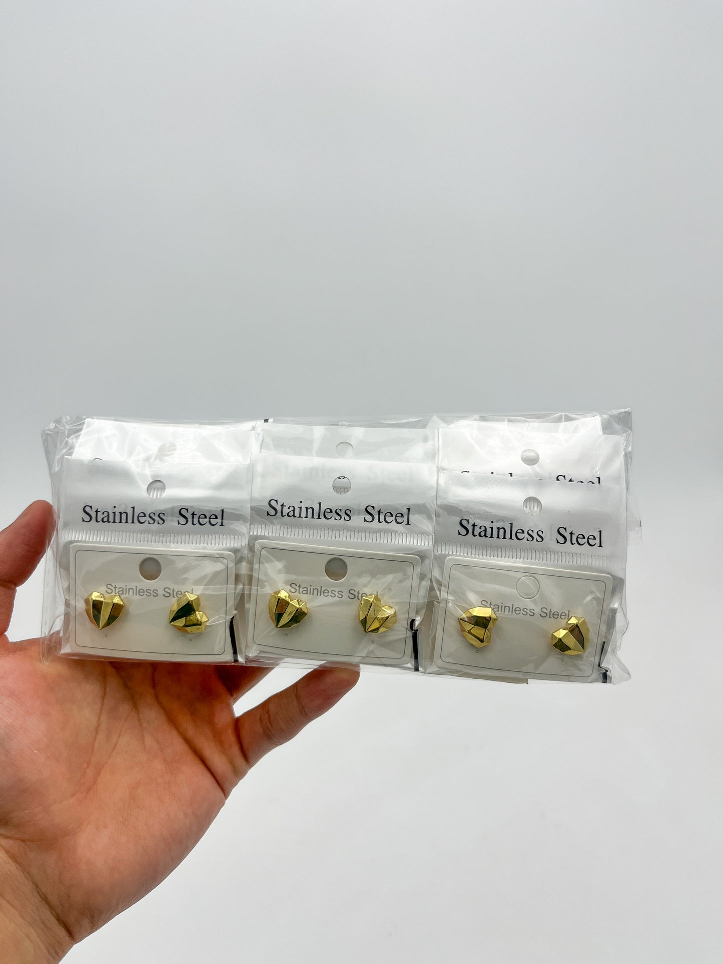 Arete de Acero Inoxidable Corazón Geométrico - Paquete de 12 piezas $16.33 c/u